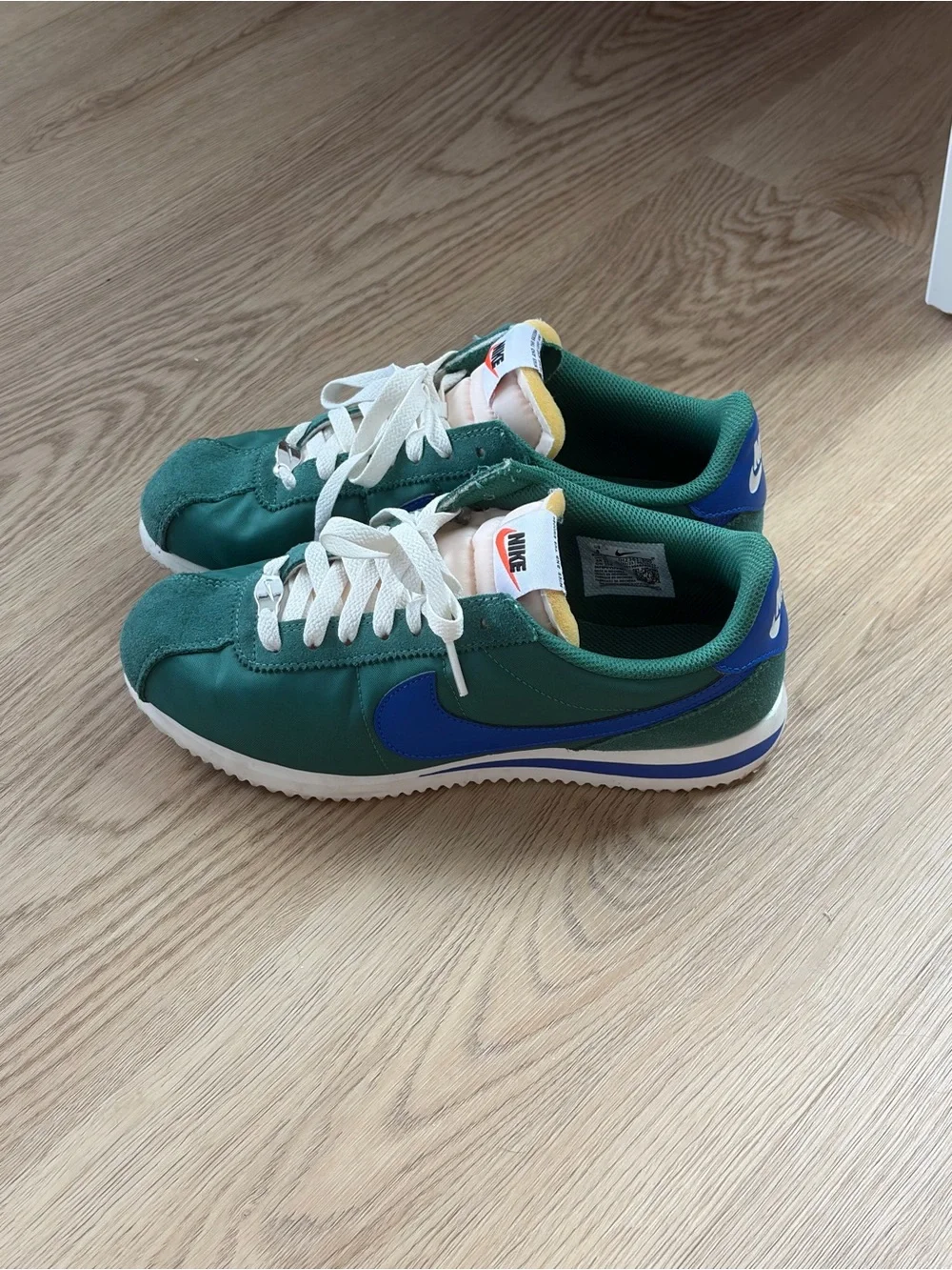 Nike Cortez TXT sneakers in Evergreen Aura/Hyper Royal